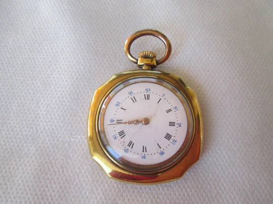 Open-face swiss pocket watch. Octogonal case. Gold plated metal