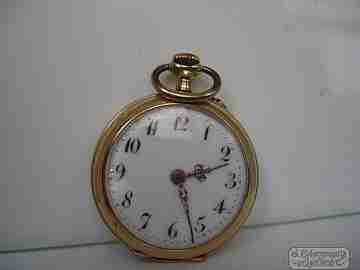 Open-faced. 14 karat gold. 1920's. Blue enamel. Stem-wind. Swiss