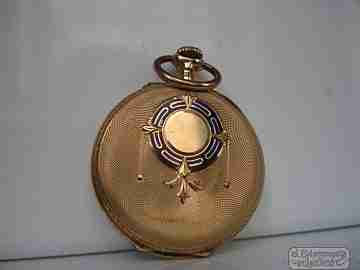 Open-faced. 14 karat gold. 1920's. Blue enamel. Stem-wind. Swiss