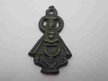 Openwork bronze spanish medal. Virgin with half moon and cherub. 18th century