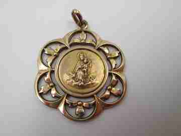 Openwork golden metal medal. Virgin with Child. Vegetable motifs. 1940's