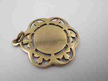 Openwork golden metal medal. Virgin with Child. Vegetable motifs. 1940's