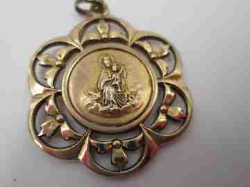 Openwork golden metal medal. Virgin with Child. Vegetable motifs. 1940's
