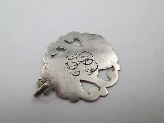 Openwork religious medal. Saint Joseph with the Child. Sterling silver. Europe. 1940's