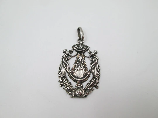 Openwork religious medal. Virgin Mary with mantle and staff. Sterling silver. 1960's
