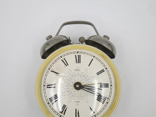 Orel alarm clock. Hand winding. Bitone plastic and silver metal. 1970's. USSR