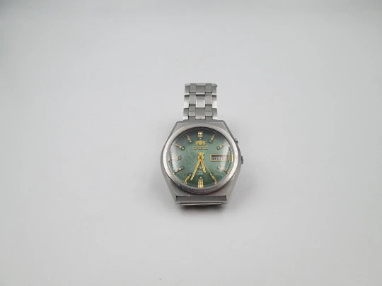Orient Crystal 3 Stars. Steel. Automatic. Calendar. Green textured dial. Bracelet. 1970's Orient Crystal 3 Stars. Steel. Automatic. Calendar. Green textured dial. Bracelet. 1970's