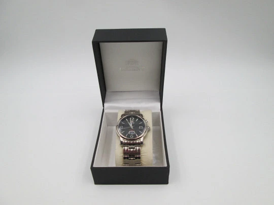 Orient Titanium. Automatic. Calendar. Textured chess dial. Bracelet. Box. 1990's