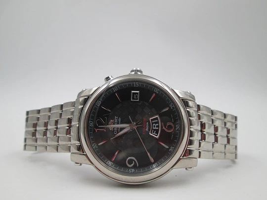 Orient Titanium. Automatic. Calendar. Textured chess dial. Bracelet. Box. 1990's