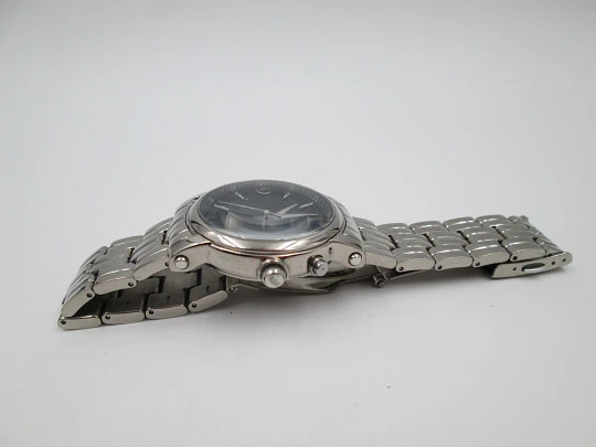 Orient Titanium. Automatic. Calendar. Textured chess dial. Bracelet. Box. 1990's