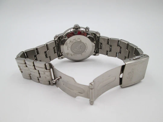 Orient Titanium. Automatic. Calendar. Textured chess dial. Bracelet. Box. 1990's