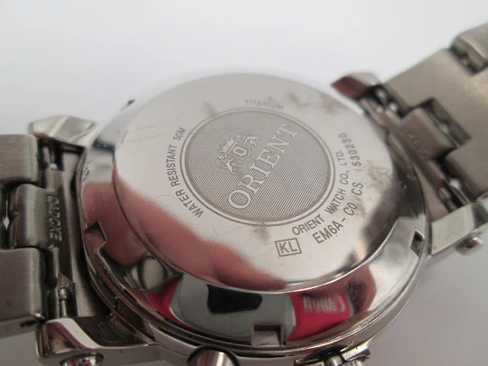 Orient Titanium. Automatic. Calendar. Textured chess dial. Bracelet. Box. 1990's