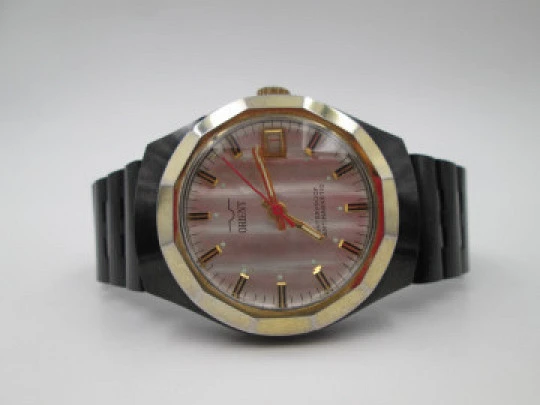 Orient watch. Black blued metal & steel. Golden bezel. Manual wind. Bracelet. 1980's