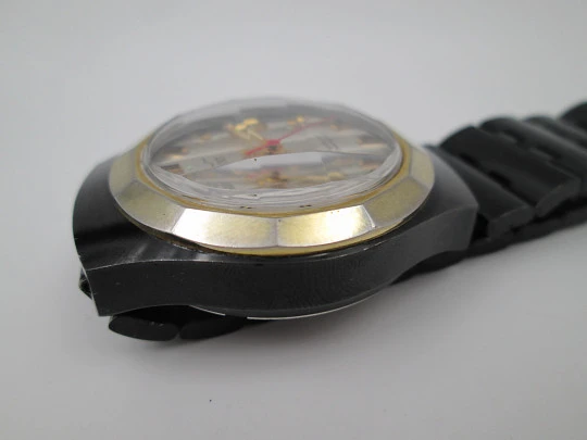 Orient watch. Black blued metal & steel. Golden bezel. Manual wind. Bracelet. 1980's