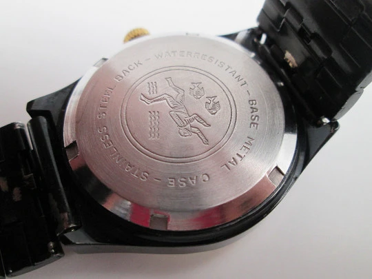 Orient watch. Black blued metal & steel. Golden bezel. Manual wind. Bracelet. 1980's