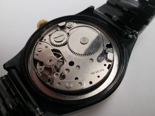 Orient watch. Black blued metal & steel. Golden bezel. Manual wind. Bracelet. 1980's