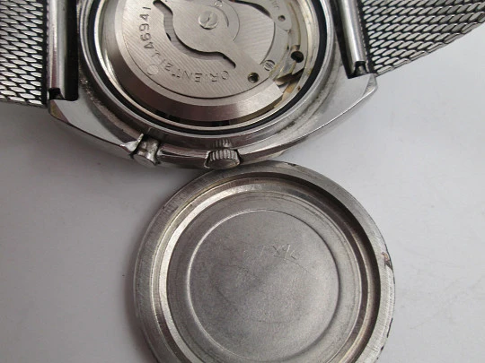 Orient. Acero inoxidable. Dial verde. Cristal facetado. Calendario. Automático. Brazalete