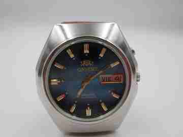 Orient. Automatic. Date & day. Leather strap. 1970's. Japan. Blue dial