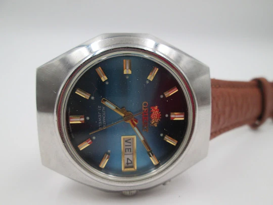 Orient. Automatic. Date & day. Leather strap. 1970's. Japan. Blue dial