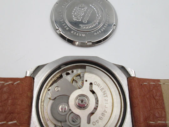 Orient. Automatic. Date & day. Leather strap. 1970's. Japan. Blue dial Orient. Automatic. Date & day. Leather strap. 1970's. Japan. Blue dial