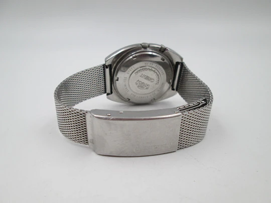 Orient. Stainless steel. Automatic. Calendar. Green dial. Faceted crystal. Bracelet. 1970's