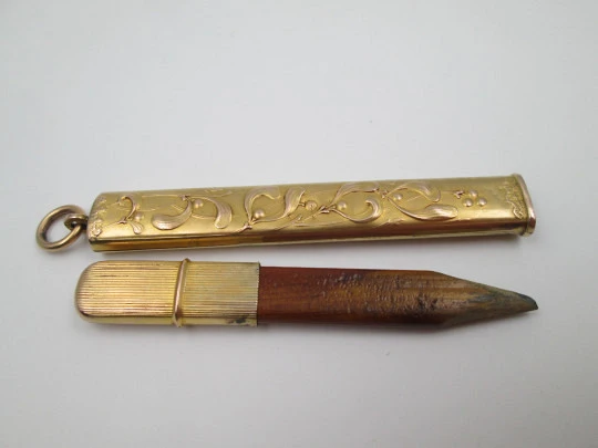 Oril pencil holder with pencil. Gold plated. Floral and vegetable motifs. Europe. 1910's