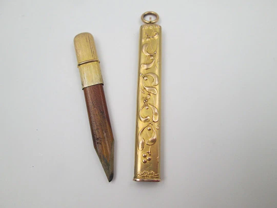 Oril pencil holder with pencil. Gold plated. Floral and vegetable motifs. Europe. 1910's