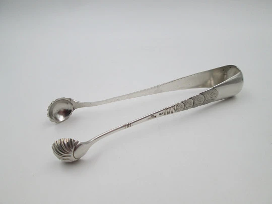 Ornate ice tongs. 800 sterling silver. Shells and sun rays motifs. Germany. 1960's