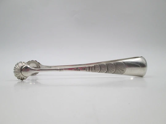 Ornate ice tongs. 800 sterling silver. Shells and sun rays motifs. Germany. 1960's