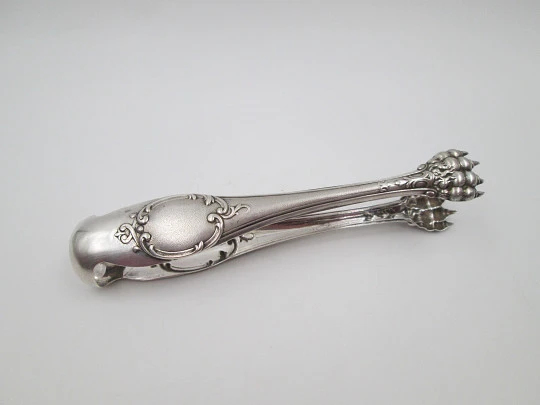 Ornate ice tongs. Sterling silver. Vegetable motifs, shield and claws. Spain. 1970's