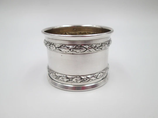 Ornate napkin ring. Sterling silver. Vermeil on inside. Plants motifs. 1970's. France