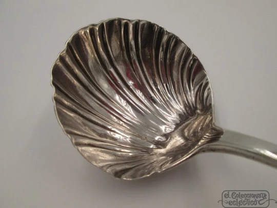 Ornate silver jam shell spoon. 1940's. Saint Peter hand with key