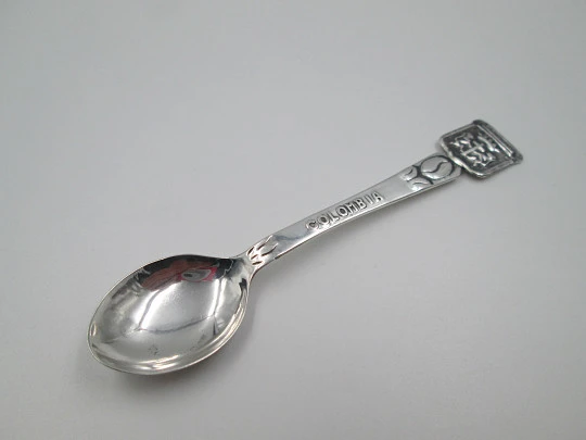 Ornate spoon. Sterling silver. Cartagena shield and coffee bean. Colombia. 1980's