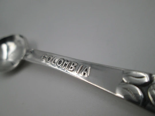Ornate spoon. Sterling silver. Cartagena shield and coffee bean. Colombia. 1980's