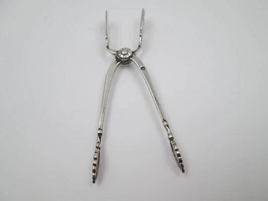 Ornate sugar tongs. 925 sterling silver. Shells and floral motifs. Spain. 1970's