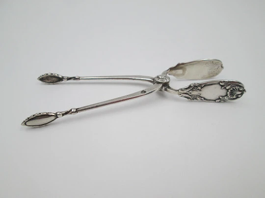Ornate sugar tongs. 925 sterling silver. Shells and floral motifs. Spain. 1970's