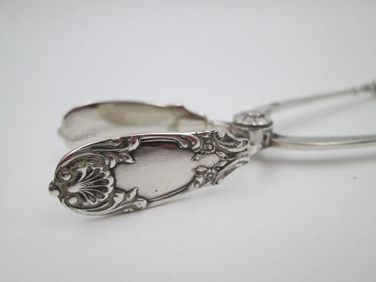 Ornate sugar tongs. 925 sterling silver. Shells and floral motifs. Spain. 1970's