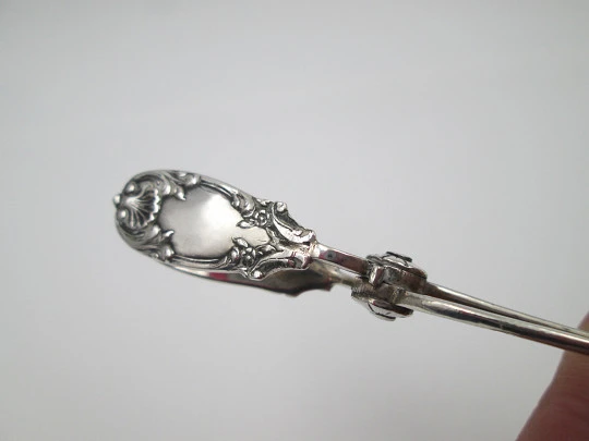 Ornate sugar tongs. 925 sterling silver. Shells and floral motifs. Spain. 1970's