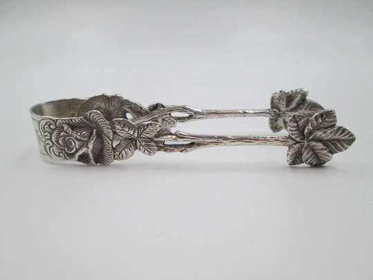 Ornate sugar tongs. Sterling silver. Floral & vegetable motifs. Germany. 1970's