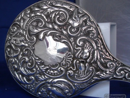 Ornate woman's hand mirror. 1970's. Embossed sterling silver. Spain