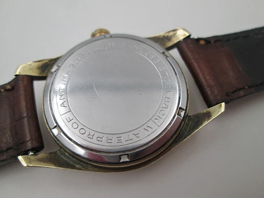 Orval. Gold plated and stainless steel. Textured dial. Small seconds hand. Manual wind. 1960's