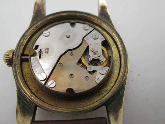Orval. Gold plated and stainless steel. Textured dial. Small seconds hand. Manual wind. 1960's