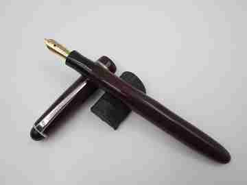 Osmiroid 65 fountain pen. Garnet and black plastic. Silver plated details. Lever filler. 1950