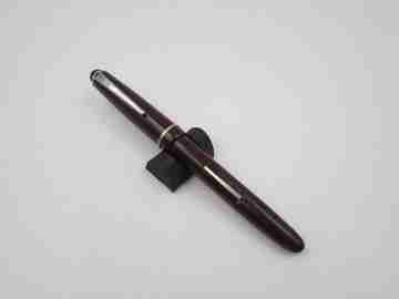Osmiroid 65 fountain pen. Garnet and black plastic. Silver plated details. Lever filler. 1950