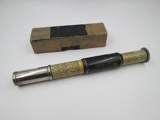 Otis King pocket calculator. Silver plated metal and black lacquer. United Kingdom. 1940's Otis King pocket calculator. Silver plated metal and black lacquer. United Kingdom. 1940's