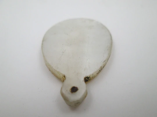 Oval nacre medal. Virgin with mantle and radiant crown. Hole on top. 1910's. Spain