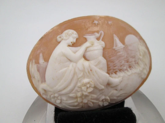 Oval shell cameo. Nymph with amphora in seascape. High relief work. Europe. 1940's