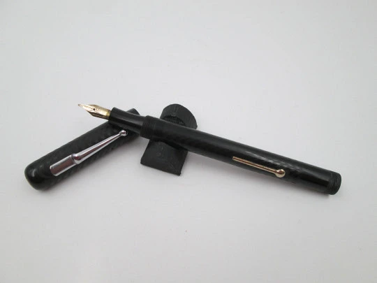 P.W fountain pen. Hard rubber and bitone metal. 14k gold nib. Lever filler. 1920's