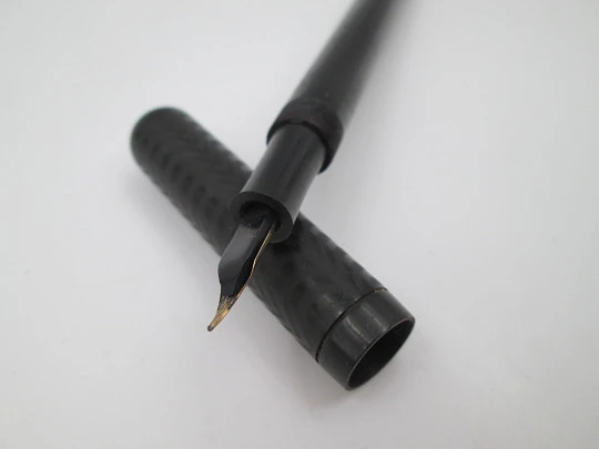 P.W fountain pen. Hard rubber and bitone metal. 14k gold nib. Lever filler. 1920's