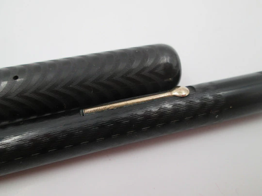P.W fountain pen. Hard rubber and bitone metal. 14k gold nib. Lever filler. 1920's